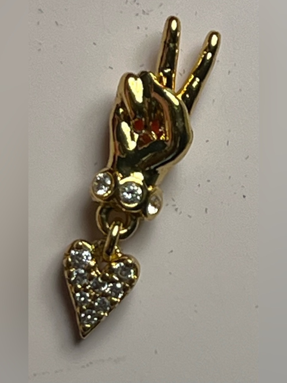 kate spade Gold-tone Peace Hand Drop Earrings with Crystal Hearts - Picture 3 of 4